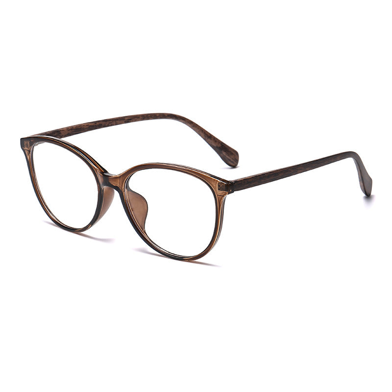 (6 PACK) Wholesale Eyeglasses Frames New Arrival Vintage TR Wood Grain Women Korean Cat Eye Antiblue Light 2025 - BulkSunglassesWholesale.com - Clear Tea Frame