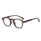 (6 PACK) Wholesale Eyeglasses Frames New Arrival Antiblue Light Fashion Rivet Korean Wood Grain Small Trendy 2025 - BulkSunglassesWholesale.com - Clear Tea Frame