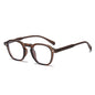 (6 PACK) Wholesale Eyeglasses Frames New Arrival Antiblue Light Fashion Rivet Korean Wood Grain Small Trendy 2025 - BulkSunglassesWholesale.com - Clear Tea Frame