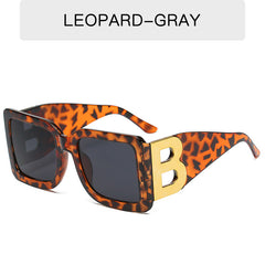 (12 PACK) Wholesale Sunglasses 2023 - BulkSunglassesWholesale.com - Leopard Print Frame Black Black Lens